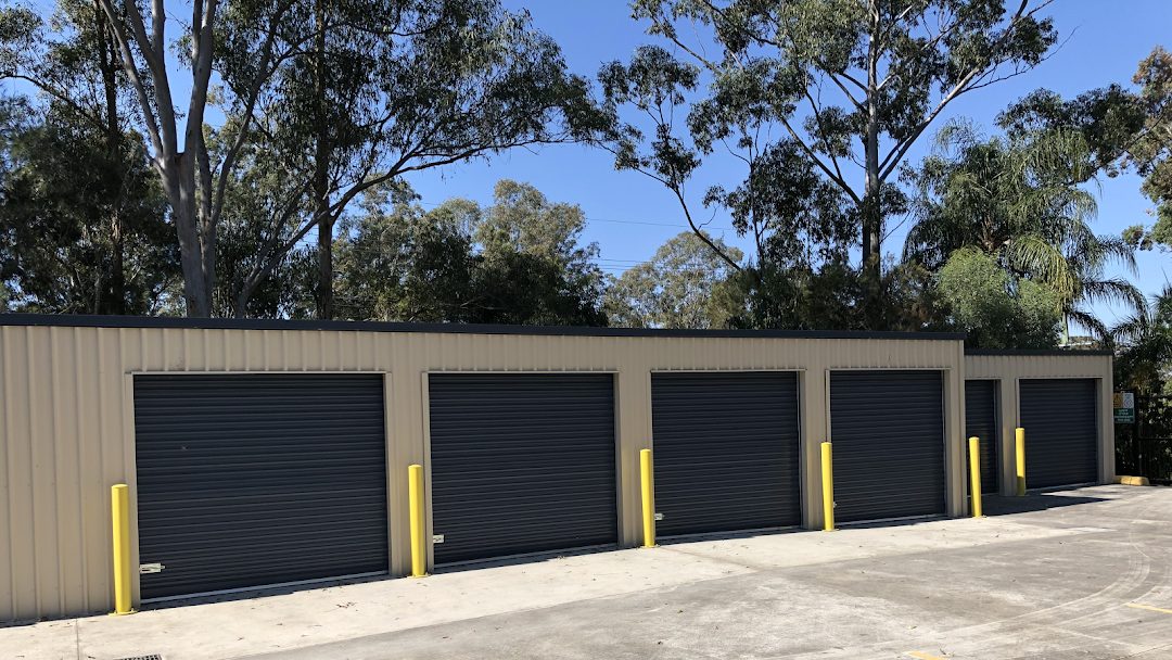 Row of drive-up storage units with roller doors at J&L Storage Solutions, Mount Cotton